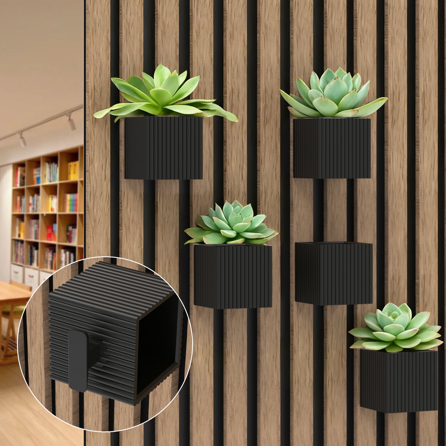 Small plant holder installed on acoustic slat wall